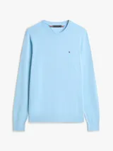 Sweater de punto celeste de cuello redondo, de manga larga con puños y bajo de canalé, confeccionado por Tommy Hilfiger en puro algodón con un pequeño logo bordado en el pecho.