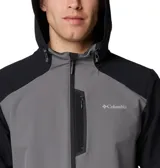 Campera softshell con capucha, de diseño bicolor en gris y negro. Cuenta con cierre frontal completo, bolsillo vertical en el pecho con cierre y bolsillos laterales. Presenta logo de la marca estampado en el pecho y puños elásticos.