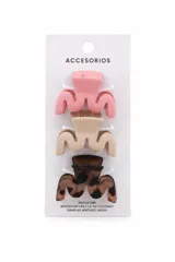 Pack de tres pinzas para el pelo con diseño ondulado. Incluye una pinza rosa, una beige y una con estampado carey.