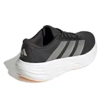 Championes de running Adidas Galaxy 8 W para mujer, de color negro con suela blanca amortiguada, entresuela esculpida y detalles reflectantes.