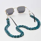 Correa para lentes con cadena de eslabones grandes color azul con detalles en blanco.