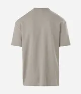 Remera masculina de algodón y poliéster, color verde claro, con cuello redondo, manga corta y corte relajado. Presenta una textura de mini waffle.