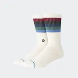 Medias de caña media color beige con franjas horizontales de colores en la parte superior y logo de la marca bordado en el lateral.