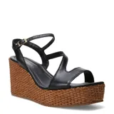Sandalias de plataforma Bottero de cuero color negro, con diseño de tiras cruzadas y taco chino revestido en tejido estilo yute entrelazado. Cuenta con tira ajustable al tobillo con hebilla metálica dorada.