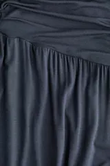 Pantalón globo negro de punto de viscosa, con cintura elástica ancha fruncida y piernas anchas con elástico revestido en los tobillos.