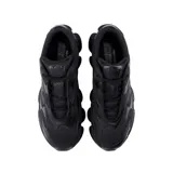 Championes New Balance modelo WRPD Runner, color negro total. Presentan un diseño moderno con base de malla técnica y superposiciones sintéticas con formas orgánicas. Cuentan con una entresuela voluminosa y esculpida que proporciona amortiguación avanzada.