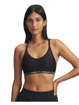Top deportivo Under Armour con diseño de espalda cruzada, escote en V profundo y paneles de malla para mayor transpirabilidad. Cuenta con banda elástica inferior con el logo de la marca y copas extraíbles.