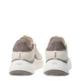 Championes Puma Softride Mayve 2 de mujer, en color beige con detalles en marrón y logo dorado metalizado. Confeccionados en tejido textil transpirable con refuerzos sintéticos, presentan suela gruesa amortiguada y cierre con cordones.