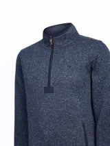 Polar de hombre color azul navy con efecto jaspeado, cuello alto y medio cierre frontal. Cuenta con bolsillos laterales y detalles en tono oscuro.