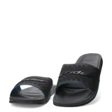 Sandalias tipo slide Rider, color negro con detalle interior en azul. Presentan una banda ancha con textura acanalada y el logo de la marca en relieve.