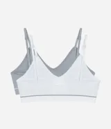 Kit de dos soutienes sin copa ni aro, uno blanco y otro gris, confeccionados en tejido seamless texturizado de microfibra. Ambos tienen escote en V, breteles finos ajustables y una banda elástica con el logo "Lov" en la parte inferior.