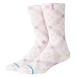 Medias Stance con diseño de flores y lunares en tonos lila y rosa.