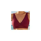 Conjunto de bikini azul de dos piezas, compuesto por un corpiño estilo triángulo con detalles de transparencia y una bombacha de tiro alto con fruncidos laterales y detalles translúcidos.