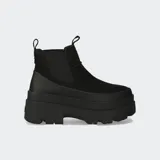 Botas Chelsea negras de cuero impermeable con plataforma de 4.4 cm y tacón de 6.35 cm.