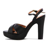 Sandalia de tacón alto Vizzano, color negro, con plataforma delantera, tiras cruzadas en la parte frontal y tira ajustable con hebilla en el tobillo.