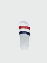Sandalias de playa blancas con franjas azul marino, blanco y rojo en la tira superior. Logo de Moncler en relieve en la tira.