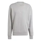 Buzo de cuello redondo Adidas, confeccionado en felpa francesa de algodón. Presenta un diseño de corte holgado con puños y ruedo acanalados, destacando por el logo de la marca bordado sutilmente en el centro del pecho.