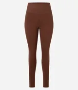Legging deportiva Get Over de tiro alto, confeccionada en microfibra elástica, con bolsillos laterales funcionales y largo hasta el tobillo.