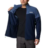 Polar Columbia de hombre, modelo Basin Trail III Full Zip, color azul marino con bloques de color azul más claro en hombros y parte superior del pecho. Presenta cuello alto, cierre frontal completo y bolsillos laterales con cierre.