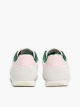 Zapatillas deportivas Tommy Jeans de estilo retro, color blanco con detalles en verde y rosa. Confeccionadas en poliéster con paneles de texturas mixtas, logo de la marca en el lateral y suela de goma.