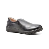 Zapato casual Korium Confort modelo Katie de color marrón, con diseño tipo mocasín, cierre lateral con cremallera y suela negra texturizada.