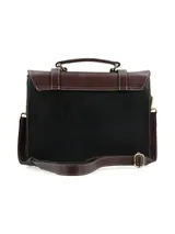 Cartera tipo maletín con diseño tricolor en tonos marrón, crema y negro, confeccionada en cuero sintético con textura granulada. Presenta solapa frontal con correas decorativas y hebillas metálicas, asa superior rígida y correa ajustable para hombro.