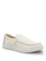 Zapatillas slip-on estilo alpargata color beige, con capellada de textil, suela de EVA liviana y diseño sin cordones.