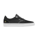 Championes de skate Emerica modelo Dickson, color negro con suela blanca. Presentan diseño de perfil bajo, confeccionados en gamuza con detalles de costuras reforzadas, logo de la marca en el lateral y en el talón, y ojal superior metálico con detalle decorativo.