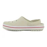 Zuecos Crocs modelo Crocband color beige, con perforaciones superiores para ventilación, tira trasera rebatible, banda blanca en la mediasuela con línea rosada y logo circular en el lateral.