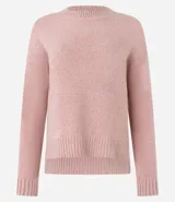 Suéter de punto texturizado con cuello redondo y mangas largas con sisa caída. Presenta un diseño liso y holgado, ideal para un estilo casual y versátil.