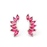 Par de aros trepadores plateados con cristales rosas en forma de lágrima.