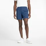 Short deportivo New Balance de la línea Tournament, color azul, con cintura elástica y bolsillos laterales diseñados para pelotas de tenis. Cuenta con tecnología de secado rápido NB DRY.