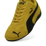 Championes Puma Speedcat OG amarillos con detalles en negro, confeccionados en gamuza.