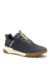Championes Caterpillar modelo Hex Ready Lo, color azul marino con detalles en beige y amarillo. Confeccionados en cuero tipo nubuck y malla de nylon, cuentan con suela de goma dentada de alta tracción y amortiguación mejorada.