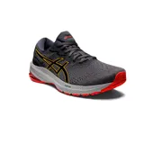 Championes de running Asics GT-1000 11, color gris oscuro y negro con detalles en amarillo y suela roja. Incorpora tecnología FlyteFoam en la entresuela.