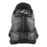 Championes de running Salomon Aero Glide 4, color negro con diseño texturizado en la parte superior, suela de gran amortiguación y logo de la marca en el lateral.