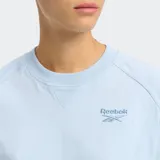 Remera Reebok Icon Elements color celeste, de corte cropped y mangas cortas.