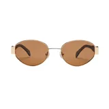 Lentes de sol I-Sea modelo Lennox, con marco delgado de metal dorado y cristales polarizados en tono marrón claro, de diseño ovalado y líneas simples.