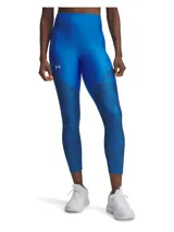 Calza deportiva Under Armour de tiro alto, confeccionada en tejido elástico con tecnología de secado rápido. Presenta un diseño bicolor en tonos azules, combinando una parte superior lisa con paneles inferiores estampados con textura sutil. Incluye bolsillo lateral y logo de la marca en el muslo derecho.