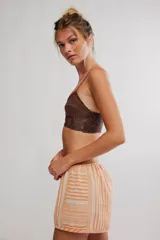 Bralette largo marrón de tela plumetí con botonadura frontal, escote en V con detalles de encaje y tiras finas regulables.