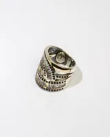 Anillo ancho de plata 925 con apliques de oro y circonitas blancas y negras.