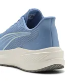 Championes de running Puma Dasher Lite color celeste con detalles en blanco y suela amortiguada.