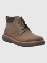 Bota de cuero marrón con ajuste de cordones, cuello acolchado de tejido técnico y suela tecnológica Spinal Flex de alta amortiguación.