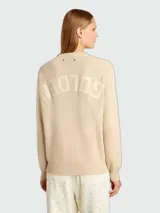 Buzo Golden Goose de tejido de punto liso en color beige, con cuello redondo y mangas largas.