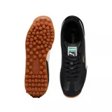 Championes urbanos Puma modelo Easy Rider Vintage, color negro con detalles en blanco y suela de goma color caramelo. Presentan una combinación de materiales en la capellada con logo de la marca en el lateral y lengüeta.