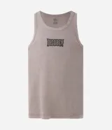 Musculosa de algodón con textura waffle, color gris topo, con corte sin mangas y detalles desgastados en los bordes. Cuenta con un estampado frontal localizado con la inscripción "Disobey".