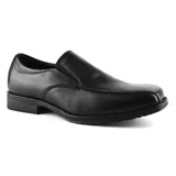 Zapato de vestir negro de cuero liso, con elástico en los laterales y suela de goma.