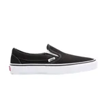Zapatillas Vans Classic Slip-On negras con suela blanca de goma y logo de la marca en el lateral.