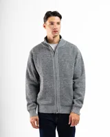 Campera de punto con cierre frontal completo, cuello alto y puños y ruedo acanalados. Presenta un diseño de tejido texturizado en tono gris jaspeado y cuenta con forro interno para mayor abrigo.