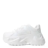 Championes blancos con plataforma alta y suela con diseño irregular.